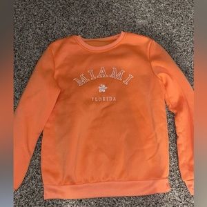 Coral crewneck